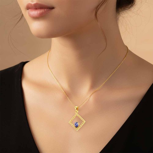 Csepp tanzanit medál arany keretben